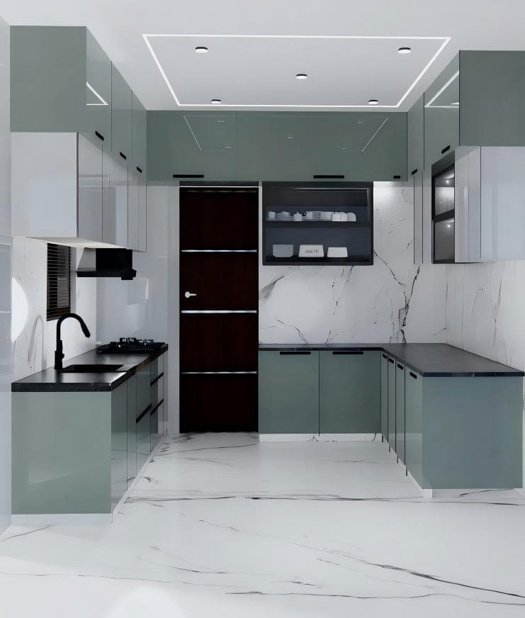 Modern kitchen with sage cabinetry and marble finishes